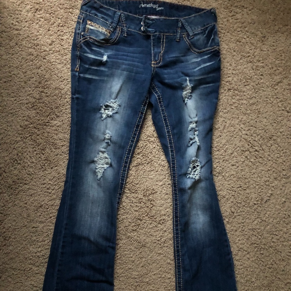 Distressed dark wash jeans